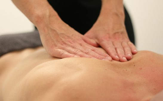 massage in the back with CBD
